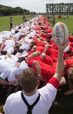 240816 - World Record attempt for the Largest Rugby Scrum - Participants set a new World Record of 1297 in the Worlds Largest Rugby Scrum at the Golden Oldies World Rugby Festival in Cardiff