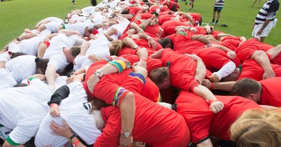 240816 - World Record attempt for the Largest Rugby Scrum - Participants set a new World Record of 1297 in the Worlds Largest Rugby Scrum at the Golden Oldies World Rugby Festival in Cardiff