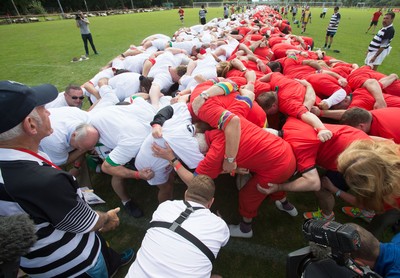 240816 - World Record attempt for the Largest Rugby Scrum - Participants set a new World Record of 1297 in the Worlds Largest Rugby Scrum at the Golden Oldies World Rugby Festival in Cardiff