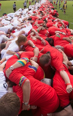 240816 - World Record attempt for the Largest Rugby Scrum - Participants set a new World Record of 1297 in the Worlds Largest Rugby Scrum at the Golden Oldies World Rugby Festival in Cardiff