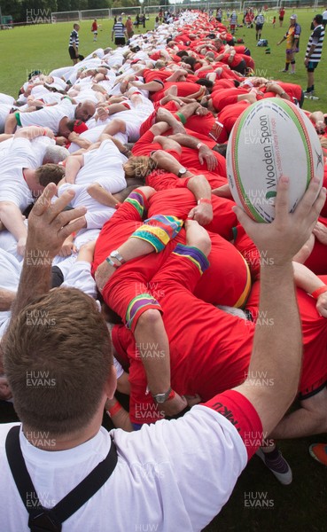 240816 - World Record attempt for the Largest Rugby Scrum - Participants set a new World Record of 1297 in the Worlds Largest Rugby Scrum at the Golden Oldies World Rugby Festival in Cardiff