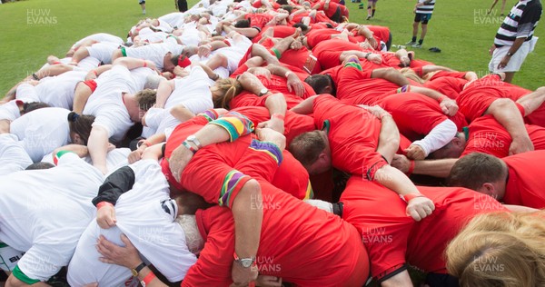 240816 - World Record attempt for the Largest Rugby Scrum - Participants set a new World Record of 1297 in the Worlds Largest Rugby Scrum at the Golden Oldies World Rugby Festival in Cardiff