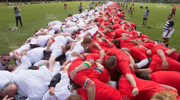 240816 - World Record attempt for the Largest Rugby Scrum - Participants set a new World Record of 1297 in the Worlds Largest Rugby Scrum at the Golden Oldies World Rugby Festival in Cardiff