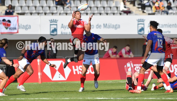 210122 - France v Wales - HSBC World Rugby Sevens Series, Malaga, Spain -  Wales Lloyd Lewis takes the ball