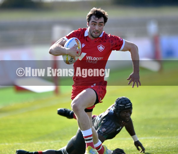 210122 - Canada v Kenya - HSBC World Rugby Sevens Series -  Canada’s Alex Russell beats tackle by Bush Mwale