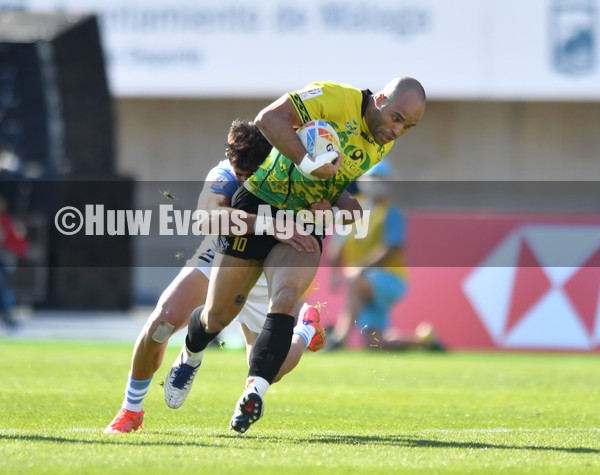 210122 - Argentina v Jamaica - HSBC World Rugby Sevens Series -  Jamaica’s  Samuel Rees is tackled by Santiago Vera Feld