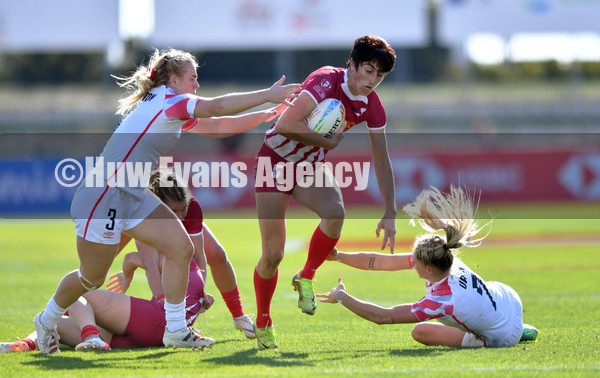 210122 - England v Russia Women- HSBC World Rugby Sevens Series -  Russia’s Baizat Khamidova is tackled by Abi Burton and Emma Uren(rt)