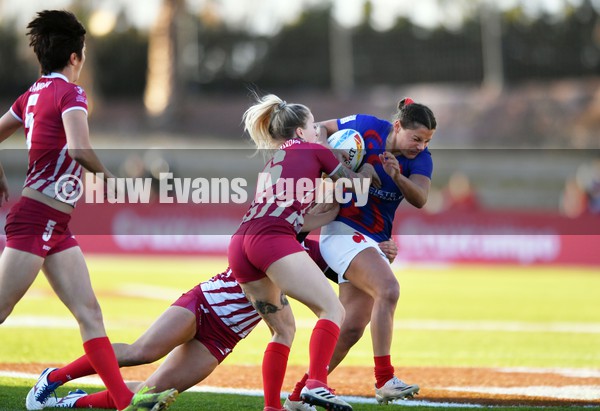 220122 - France v Russia Women  - HSBC World Rugby Sevens Series -  France's Valentine Lothoz is tackled by Daria Shestakova