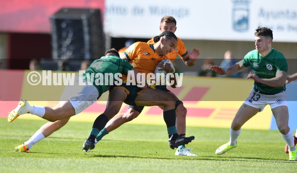 220122 - Australia v Ireland - HSBC World Rugby Sevens Series -  Australia’s Ditrich Roache is tackled by Bryan Mollen