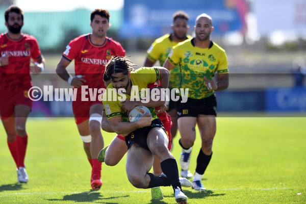 220122 - Jamaica v Spain - HSBC World Rugby Sevens Series -  Jamaica’s Melville is tackled by Spain’s Juan Martinez