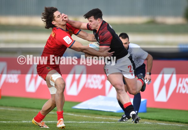 230122 - Spain v Wales  - HSBC World Rugby Sevens Series -  Wales Callum Carson is tackled by Tobias Sains-Trapaga