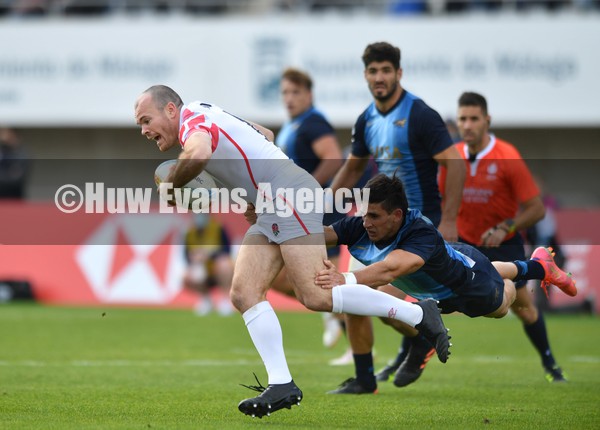 230122 - England v Argentina - HSBC World Rugby Sevens Series -  England’s Tom Bowen is tackled by Santiago Vera Feld
