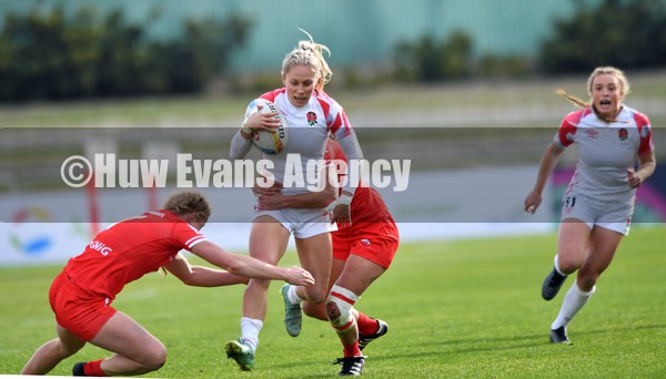 230122 - England v Poland Women- HSBC World Rugby Sevens Series -  England’s Emma Uren is tackled by Anna Klichowska and Hanna Maliszewska