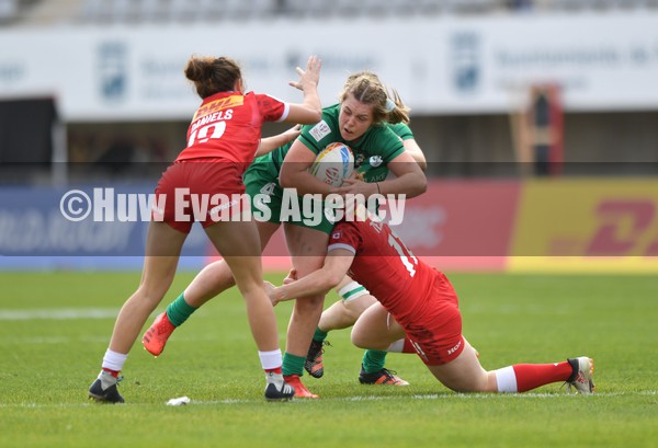 230122 - Canada v Ireland Women- HSBC World Rugby Sevens Series -  Ireland’s Brittany Hogan is tackled by Chloe Daniels and Alex Tessier