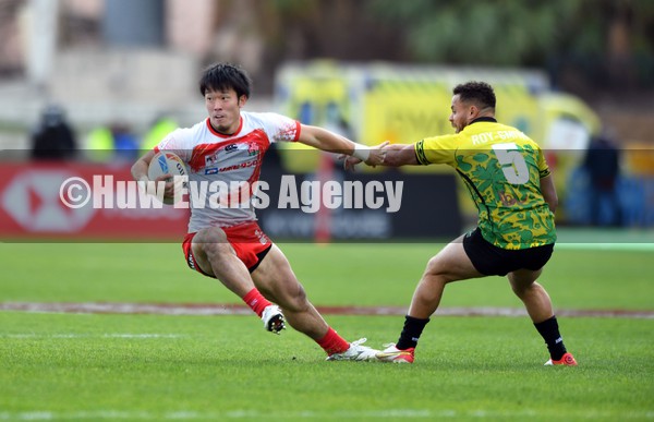 230122 - Jamaica v Japan - HSBC World Rugby Sevens Series -  Japan’s Kazuma Nakagawa tries to get around Lucas Roy-Smith