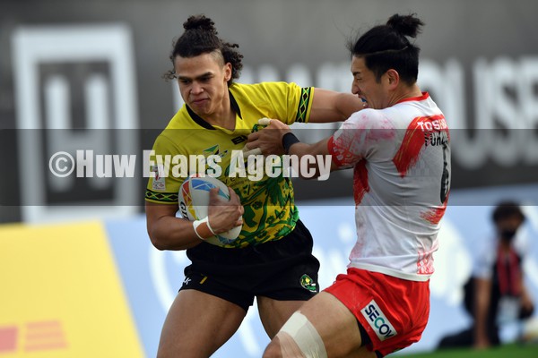 230122 - Jamaica v Japan - HSBC World Rugby Sevens Series -  Jamaica’s Oscar Clayton is tackled by Moeki Fukushi