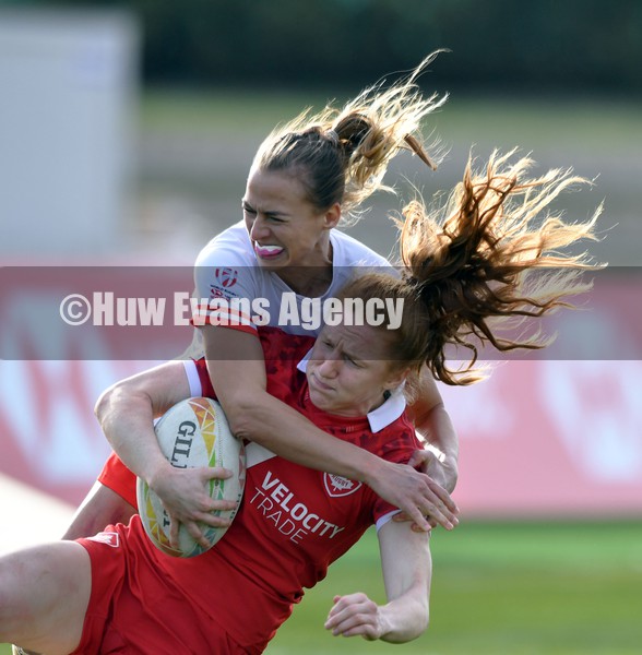 230122 - Poland v Canada Women - HSBC World Rugby Sevens Series -  Canada’s Paige Farries is tackled by Malgorzata Koldej