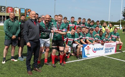090526 - Wrexham 2nd XV - Admiral National League 3 North East Trophy Presentation - Alun Roberts, WRU North Wales representative, presents the trophy to co-captains Mike Moore and Jordan Roberts of Wrexham RFC