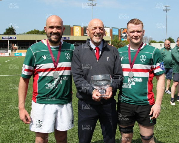 090526 - Wrexham 2nd XV - Admiral National League 3 North East Trophy Presentation - Alun Roberts, WRU North Wales representative, presents the trophy to co-captains Mike Moore and Jordan Roberts of Wrexham RFC