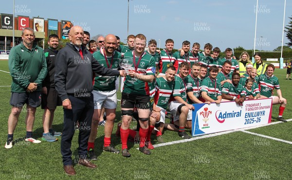 090526 - Wrexham 2nd XV - Admiral National League 3 North East Trophy Presentation - Alun Roberts, WRU North Wales representative, presents the trophy to co-captains Mike Moore and Jordan Roberts of Wrexham RFC