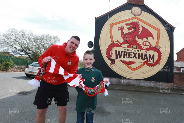220423 - Wrexham v Boreham Wood - Vanarama National League - Lots of interest in the new Welcome to Wrexham Mural on Crispin Lane near the Racecourse Jack Moulton and Ollie Moulton