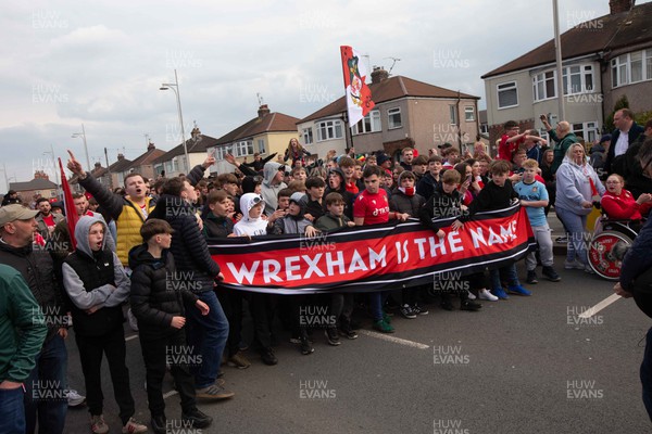 220423 - Wrexham v Boreham Wood - Vanarama National League - 12th man march by fans up to the Racecourse
