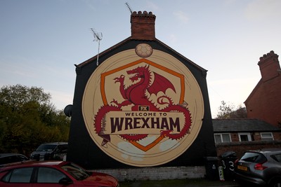 281025 - Wrexham v Cardiff City - Carabao Cup Round 4 - A welcome to Wrexham mural on a house in Wrexham