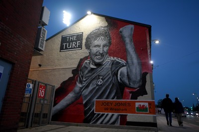 281025 - Wrexham v Cardiff City - Carabao Cup Round 4 - A mural of ex Wrexham player Joey Jones on the Famous Turf pub outside the Stok Racecourse ground in Wrexham