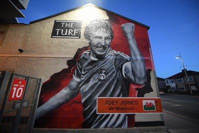 281025 - Wrexham v Cardiff City - Carabao Cup Round 4 - A mural of ex Wrexham player Joey Jones on the Famous Turf pub outside the Stok Racecourse ground in Wrexham