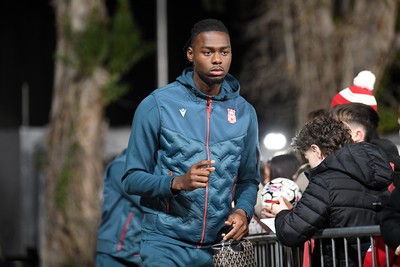 281025 - Wrexham v Cardiff City - Carabao Cup Round 4 - Arthur Okonkwo of Wrexham arrives at the stadium