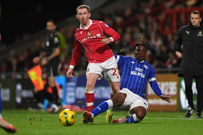 281025 - Wrexham v Cardiff City - Carabao Cup Round 4 - Lewis O'Brien of Wrexham is challenged by Ronan Kpakio of Cardiff City