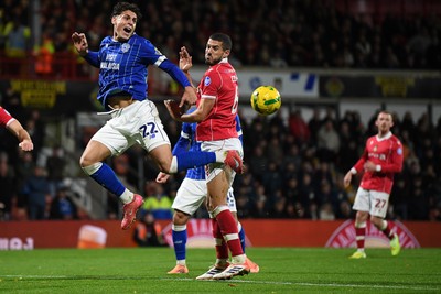 281025 - Wrexham v Cardiff City - Carabao Cup Round 4 - Yousef Salech of Cardiff City is challenged by Conor Coady of Wrexham