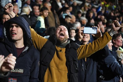 281025 - Wrexham v Cardiff City - Carabao Cup Round 4 - Cardiff fans celebrate at full time