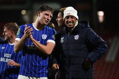 281025 - Wrexham v Cardiff City - Carabao Cup Round 4 - Will Fish of Cardiff City celebrates the win at full time with Callum Robinson of Cardiff City