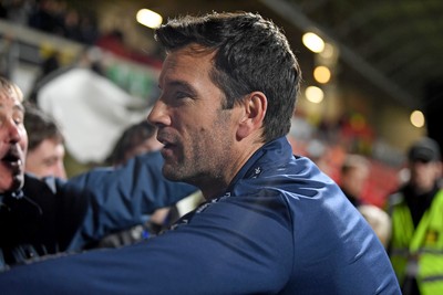 281025 - Wrexham v Cardiff City - Carabao Cup Round 4 - Cardiff City fans celebrate the win at full time with Brian Barry-Murphy, Cardiff City Manager