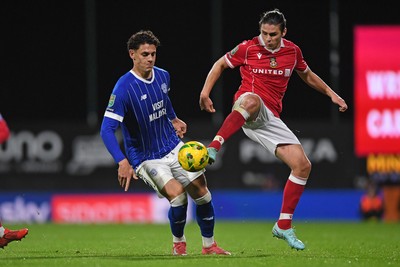 281025 - Wrexham v Cardiff City - Carabao Cup Round 4 - Yousef Salech of Cardiff City is challenged by George Dobson of Wrexham