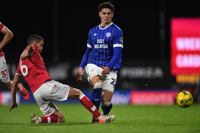 281025 - Wrexham v Cardiff City - Carabao Cup Round 4 - Yousef Salech of Cardiff City is challenged by Conor Coady of Wrexham