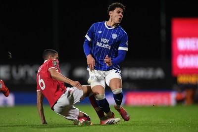 281025 - Wrexham v Cardiff City - Carabao Cup Round 4 - Yousef Salech of Cardiff City is challenged by Conor Coady of Wrexham
