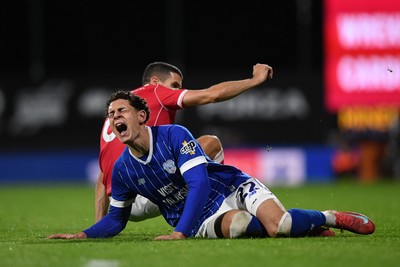 281025 - Wrexham v Cardiff City - Carabao Cup Round 4 - Yousef Salech of Cardiff City is challenged by Conor Coady of Wrexham
