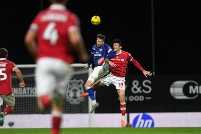 281025 - Wrexham v Cardiff City - Carabao Cup Round 4 - Calum Chambers of Cardiff City is challenged by Kieffer Moore of Wrexham