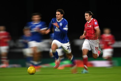281025 - Wrexham v Cardiff City - Carabao Cup Round 4 - Yousef Salech of Cardiff City is challenged by George Dobson of Wrexham