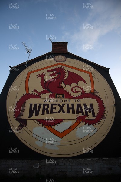281025 - Wrexham v Cardiff City - Carabao Cup Round 4 - A welcome to Wrexham mural on a house in Wrexham