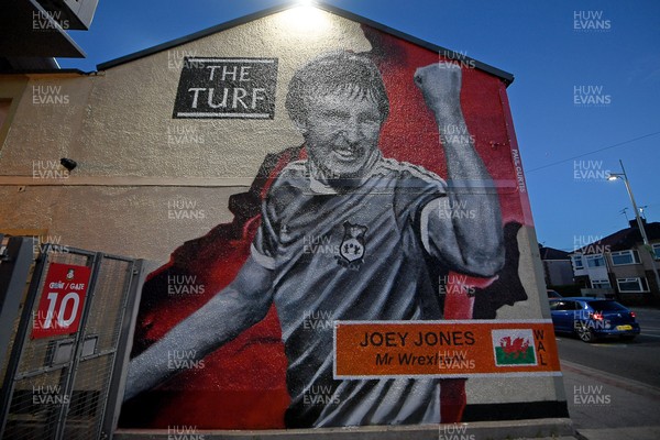 281025 - Wrexham v Cardiff City - Carabao Cup Round 4 - A mural of ex Wrexham player Joey Jones on the Famous Turf pub outside the Stok Racecourse ground in Wrexham
