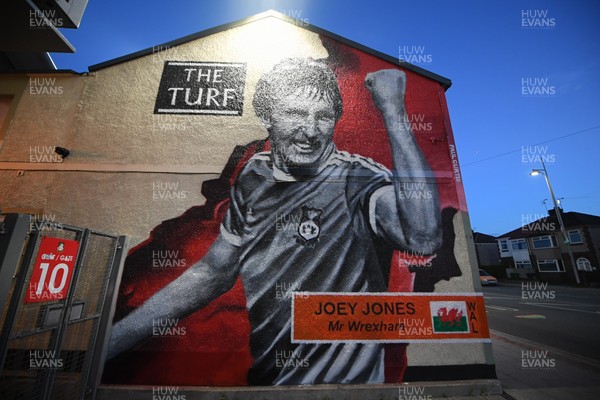281025 - Wrexham v Cardiff City - Carabao Cup Round 4 - A mural of ex Wrexham player Joey Jones on the Famous Turf pub outside the Stok Racecourse ground in Wrexham