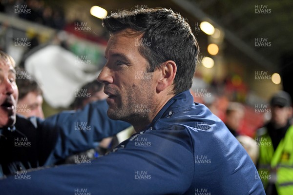 281025 - Wrexham v Cardiff City - Carabao Cup Round 4 - Cardiff City fans celebrate the win at full time with Brian Barry-Murphy, Cardiff City Manager
