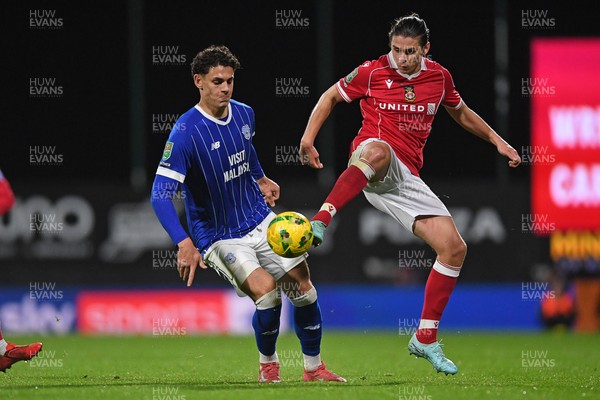 281025 - Wrexham v Cardiff City - Carabao Cup Round 4 - Yousef Salech of Cardiff City is challenged by George Dobson of Wrexham