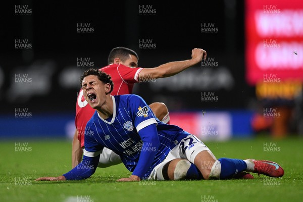 281025 - Wrexham v Cardiff City - Carabao Cup Round 4 - Yousef Salech of Cardiff City is challenged by Conor Coady of Wrexham