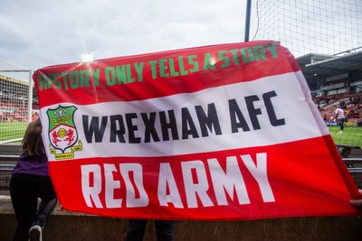 260425 - Wrexham v Charlton Athletic - Sky Bet League 1 - A Wrexham flag ahead of kick off