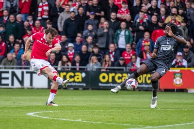 260425 - Wrexham v Charlton Athletic - Sky Bet League 1 - Oliver Rathbone of Wrexham AFC opens the scoring in the first half