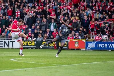 260425 - Wrexham v Charlton Athletic - Sky Bet League 1 - Oliver Rathbone of Wrexham AFC opens the scoring in the first half
